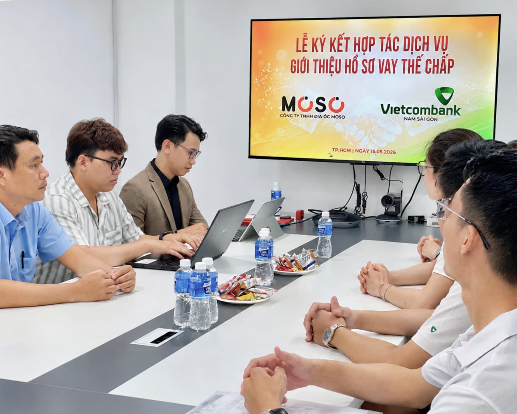 Lễ ký kết hợp tác dịch vụ vay thế chấp giữa MOSO và Vietcombank Nam Sài Gòn